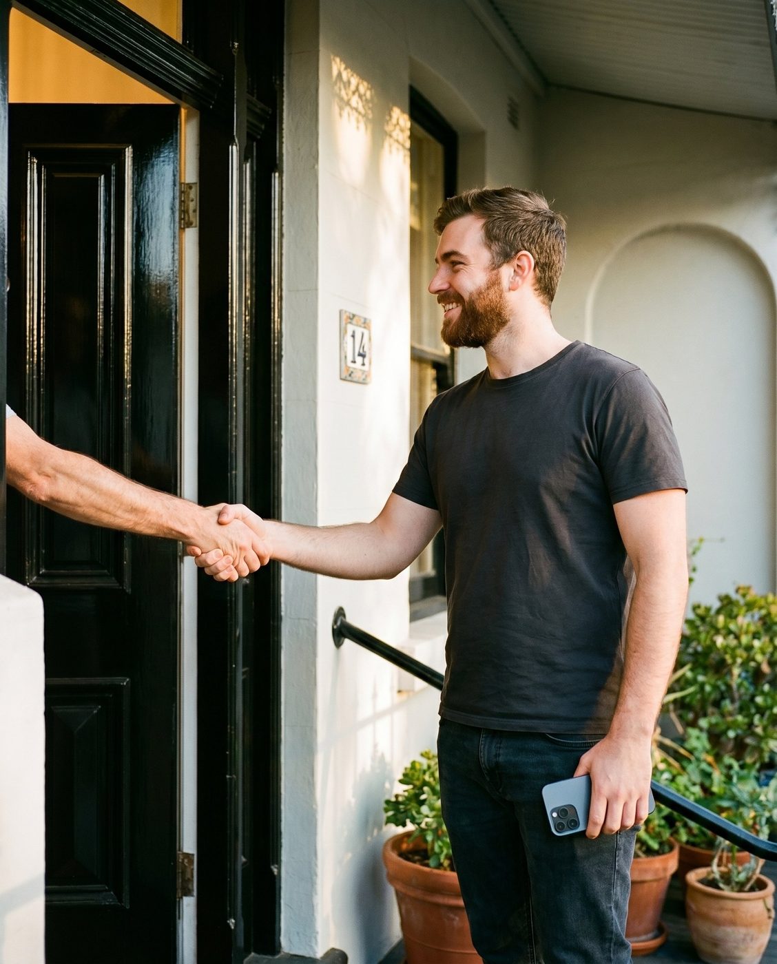 Operator handing over Australian cash to a seller at their door in Melbourne